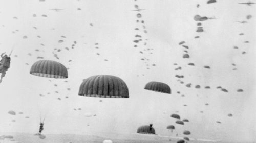 Allied aircraft drop paratroopers into German held Netherlands, for Operation Market Garden. The plan to capture key bridges in Netherlands failed with 15,000 Allied casualties.