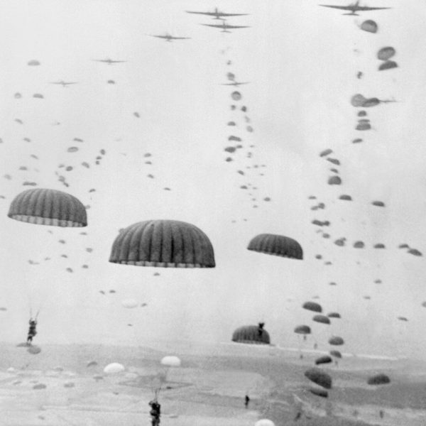 Allied aircraft drop paratroopers into German held Netherlands, for Operation Market Garden. The plan to capture key bridges in Netherlands failed with 15,000 Allied casualties.