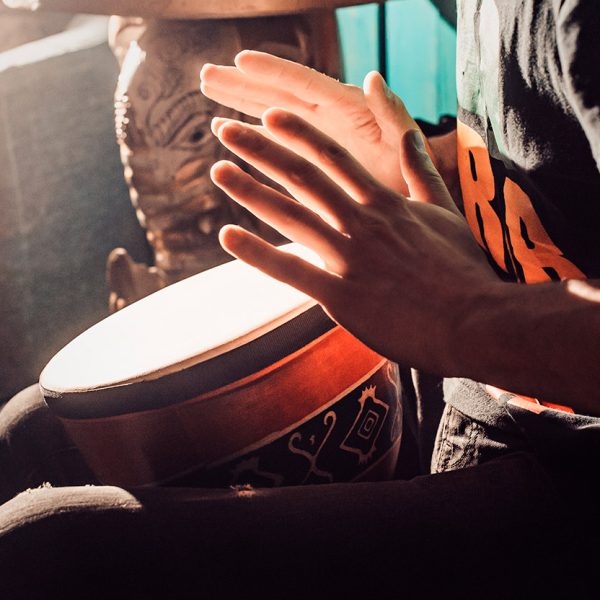 Playing the drum. Hands with a drum. another view. african, bang, beat, child, class, drum, drummer, fingers, hand, hit, instrument, kid, music, musical, percussion, play, rhythm, ring, sound.